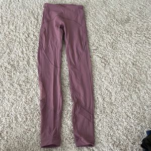 Lululemon rose colored leggings with the cutest details on the legs
